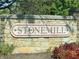 Stone exterior community sign of Stonemill at 892 Millbrook Dr, Avon, IN 46123