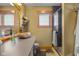 Neutral bathroom features a stone vessel sink, wood trim, and a glass enclosed shower at 8981 N 325 E, Columbus, IN 47203