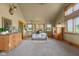 Spacious bedroom with vaulted ceilings, natural light, and rustic decor at 8981 N 325 E, Columbus, IN 47203