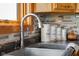 Close up of the kitchen sink with stainless steel faucet at 8981 N 325 E, Columbus, IN 47203