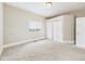 Neutral bedroom with closet and window providing natural light at 907 S A St, Elwood, IN 46036