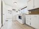 A functional laundry area with modern appliances, offering ease and convenience at 907 S A St, Elwood, IN 46036