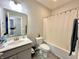 Cozy bathroom with a modern vanity, a large mirror, and shower with tub at 9133 Thames Dr, Avon, IN 46123