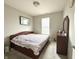 Calm bedroom with soft carpet, a dresser, and a soothing color scheme at 9133 Thames Dr, Avon, IN 46123