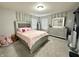 Charming bedroom with decorative ivy and a silver dresser at 9133 Thames Dr, Avon, IN 46123