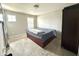 Well-lit bedroom featuring soft carpet, a wardrobe, and a neutral color scheme at 9133 Thames Dr, Avon, IN 46123