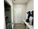 The entryway features a door, closet and built-in storage with hooks and seating at 9133 Thames Dr, Avon, IN 46123