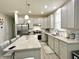 Bright, modern kitchen with stainless steel appliances, granite countertops, and an island with bar seating at 9133 Thames Dr, Avon, IN 46123