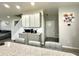 Charming kitchen features stainless steel appliances and gray cabinets offering both style and functionality at 9133 Thames Dr, Avon, IN 46123