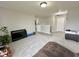 Upstairs loft with ample space, carpeting, and natural light, perfect for a lounge or office at 9133 Thames Dr, Avon, IN 46123