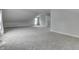 An attic bedroom features neutral walls, carpet, and window at 9317 E 36Th Pl, Indianapolis, IN 46235