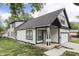 Charming two-story white home with black accents at 9317 E 36Th Pl, Indianapolis, IN 46235