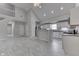 Bright, open living space with seamless flow between the living room and modern kitchen at 9317 E 36Th Pl, Indianapolis, IN 46235