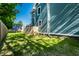 Spacious backyard with plenty of grass and shade from mature trees overhead at 1034 N Tacoma Ave, Indianapolis, IN 46201
