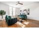 Bright living room with hardwood floors, comfortable seating, and contemporary decor at 1034 N Tacoma Ave, Indianapolis, IN 46201