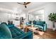 Open-concept living room with hardwood floors that flows to kitchen and dining room at 1034 N Tacoma Ave, Indianapolis, IN 46201