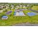 Aerial view of neighborhood pool, playground, and basketball court at 10717 Morristown Ct, Carmel, IN 46032