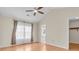 Bedroom featuring hardwood floors, lots of light, and an ensuite bathroom at 10717 Morristown Ct, Carmel, IN 46032