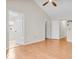 Spacious room with multiple doorways and hardwood flooring at 10717 Morristown Ct, Carmel, IN 46032