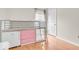 Bedroom showcasing the loft bed, hardwood floors, and ample natural light from the window at 10717 Morristown Ct, Carmel, IN 46032