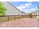 A generously sized wood deck overlooks the backyard at 10717 Morristown Ct, Carmel, IN 46032
