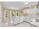 Eat-in kitchen featuring white cabinetry and lots of natural light at 10717 Morristown Ct, Carmel, IN 46032