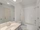 Clean bathroom with a vanity, toilet, and shower/tub with a curtain at 11065 Spice Ln, Fishers, IN 46037