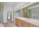 Bathroom features dual sinks, ample counter space, and large mirrors at 11065 Spice Ln, Fishers, IN 46037