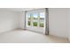 Bright bedroom with large windows overlooks a serene lake view at 11065 Spice Ln, Fishers, IN 46037