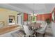 Bright dining room featuring modern lighting, stylish chairs, and an open floor plan at 11065 Spice Ln, Fishers, IN 46037