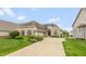 Charming home with stone accents, lush landscaping, and a spacious driveway at 11065 Spice Ln, Fishers, IN 46037