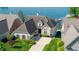 Beautiful waterfront home with manicured lawn and private boat dock access to the lake at 11065 Spice Ln, Fishers, IN 46037