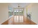 Living room with fireplace and access to the balcony through large windows at 11065 Spice Ln, Fishers, IN 46037