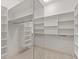 Well-organized walk-in closet offers ample shelving and storage solutions at 11065 Spice Ln, Fishers, IN 46037