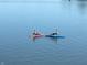 Enjoy water activities like paddleboarding on the lake, promoting an active lifestyle at 11065 Spice Ln, Fishers, IN 46037