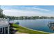 A view of a community on the water with a boat in the foreground at 11065 Spice Ln, Fishers, IN 46037