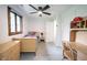 Bedroom featuring a ceiling fan, natural light, and Spiderman bedding set at 11423 Atlantic Rd, Fortville, IN 46040