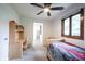 Bedroom featuring a ceiling fan, natural light, and Spiderman bedding set at 11423 Atlantic Rd, Fortville, IN 46040