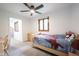 Bedroom featuring a ceiling fan, natural light, and Spiderman bedding set at 11423 Atlantic Rd, Fortville, IN 46040