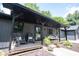 Inviting covered front porch with rocking chairs and comfortable seating arrangement at 11423 Atlantic Rd, Fortville, IN 46040