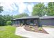 Charming house with a covered front porch and beautifully landscaped front yard at 11423 Atlantic Rd, Fortville, IN 46040
