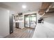 Bright kitchen with modern appliances, ample counter space, and seamless access to outdoor deck, perfect for cooking and entertaining at 11423 Atlantic Rd, Fortville, IN 46040