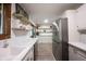 A stylish kitchen featuring stainless steel appliances, ample countertop space, and sleek design elements at 11423 Atlantic Rd, Fortville, IN 46040
