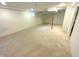 Expansive basement featuring neutral carpeting and a window for natural light at 11753 Pawleys Ct, Indianapolis, IN 46235