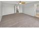 Spacious bedroom with neutral carpet and trim at 11753 Pawleys Ct, Indianapolis, IN 46235