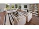 Bright living room with stylish decor, including a modern sofa, armchairs, and a unique rug at 11753 Pawleys Ct, Indianapolis, IN 46235