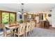 Inviting dining area adjacent to the kitchen, showcasing a spacious layout and natural light at 11875 W 700 S, Columbus, IN 47201