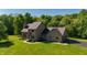 Charming home with a well-manicured lawn and professional landscaping at 11875 W 700 S, Columbus, IN 47201