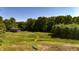 View of a garage and a field from above on a sunny day at 11875 W 700 S, Columbus, IN 47201