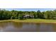 Beautiful home with a pond and manicured lawn at 11875 W 700 S, Columbus, IN 47201